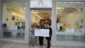 Aurora donate Cheque to Halo Children's Foundation